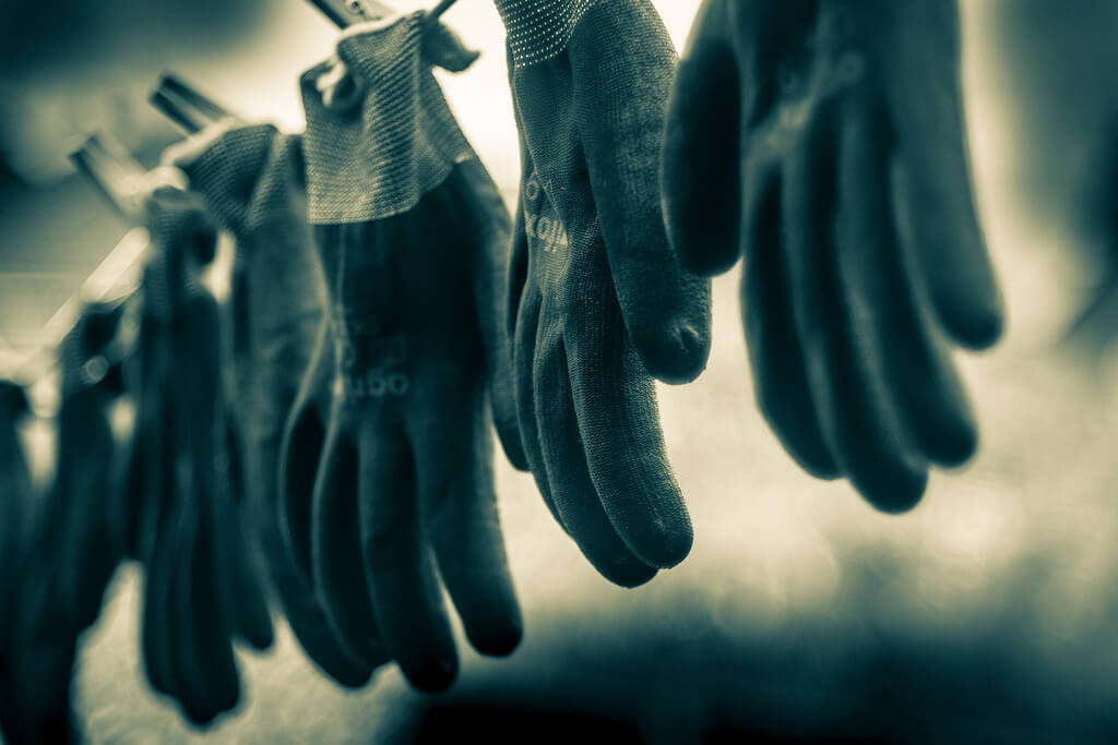 work gloves drying after being washed